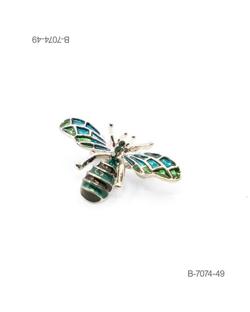 Prendedor de diseño elegante en color plateado, con forma de abeja o insecto ornamentado con esmaltes en tonos verdes y azules y pedrería oscura B7074