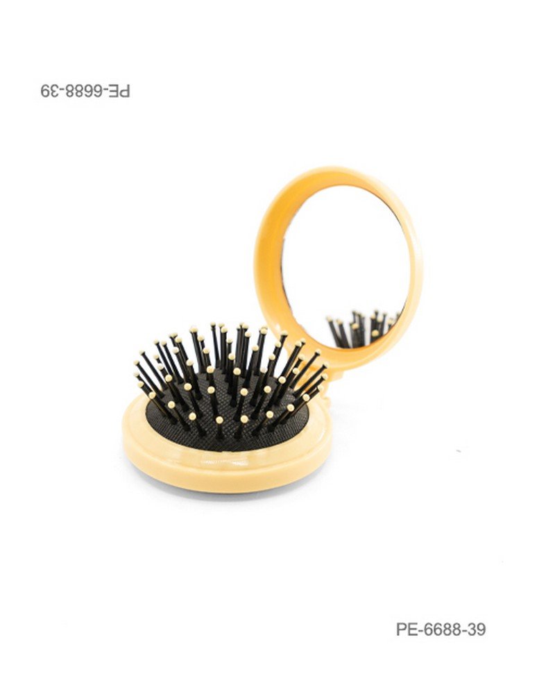 Cepillo de cabello plegable de bolsillo con espejo integrado y cerdas con puntas beige o crema, en carcasa redonda de color amarillo PE6688