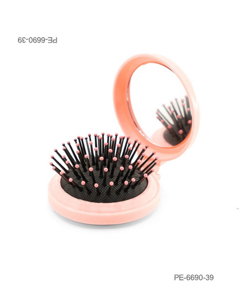 Cepillo de cabello plegable de bolsillo con espejo integrado y cerdas con puntas rosadas, en carcasa redonda de color salmón o coral PE6690