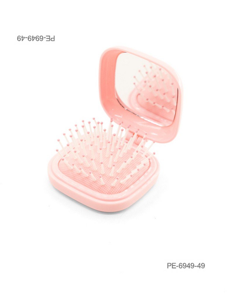 Cepillo de cabello plegable de bolsillo con espejo integrado y cerdas con puntas rosadas, en carcasa cuadrada de color rosa claro o salmón PE6949