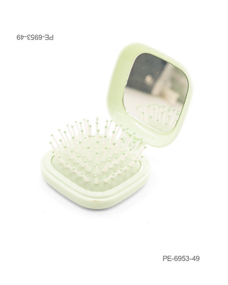 Cepillo de cabello plegable de bolsillo con espejo integrado y cerdas con puntas verdes, en carcasa cuadrada de color verde claro o menta PE6953