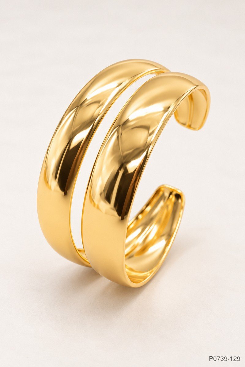 Pulsera rígida abierta con diseño abombado y acabado dorado brillante P0739