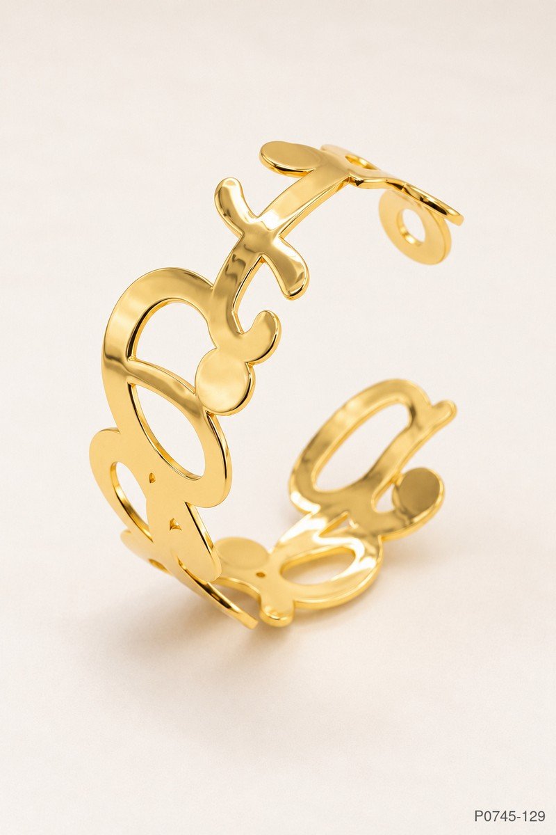 Pulsera rígida abierta con diseño recortado de siluetas estilo Mickey y acabado dorado brillante P0745
